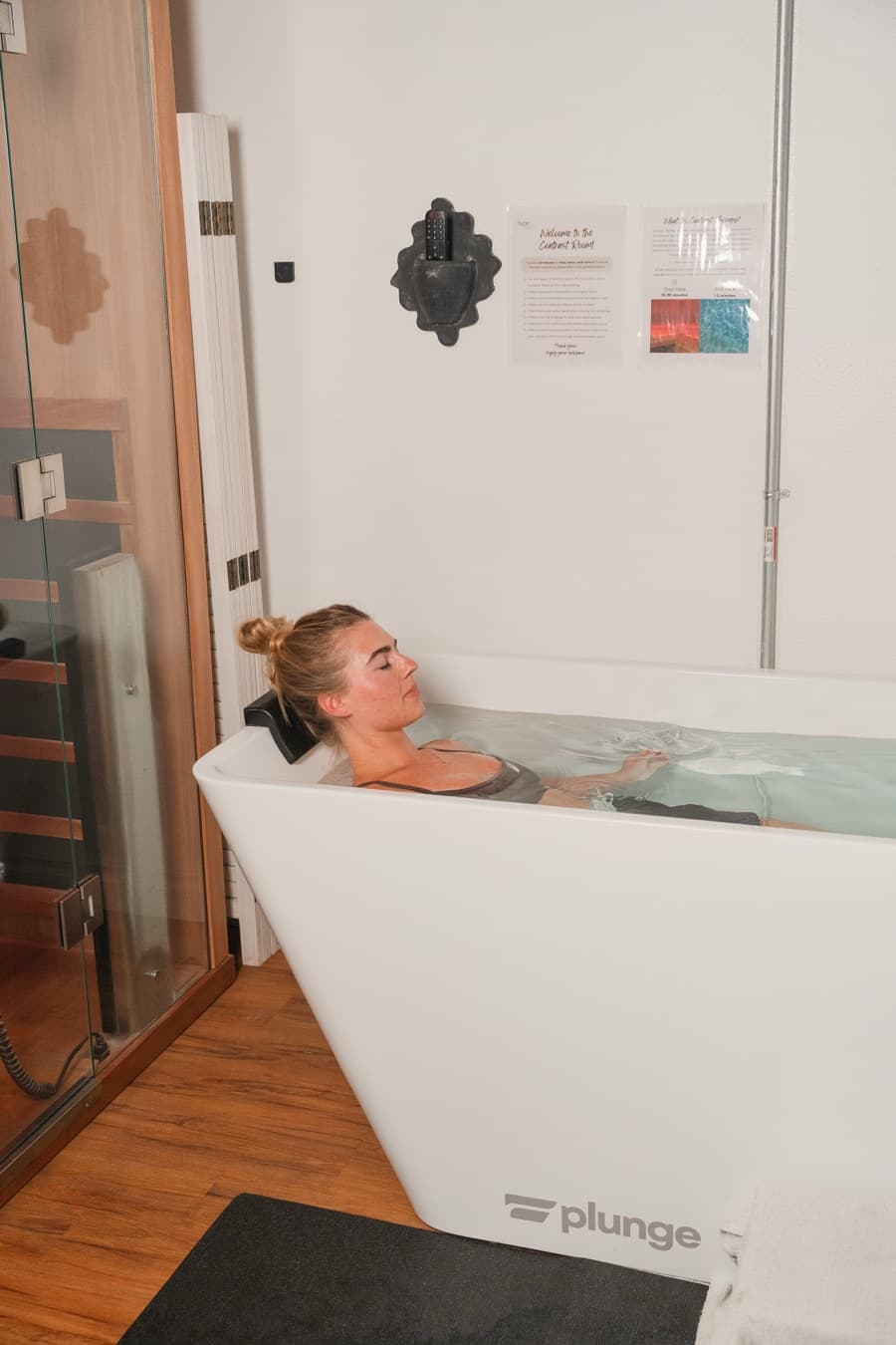 A member relaxing in the cold plunge